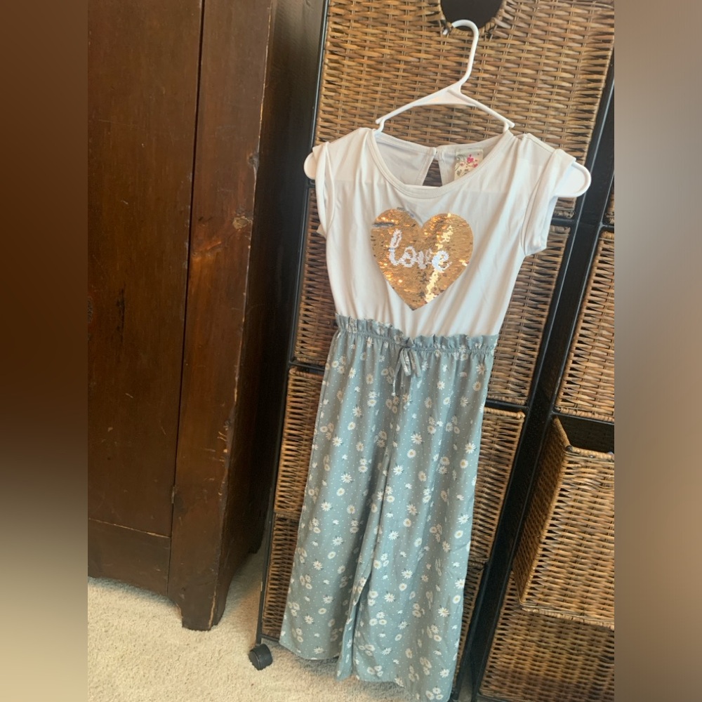 Adorable jumper perfect for any occasion this summer!